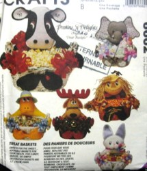 7641 MCCALLS  TREAT BASKET CHICK, LION, BABY TEDDY, ELEPHANT,COW 2 PATTERNS